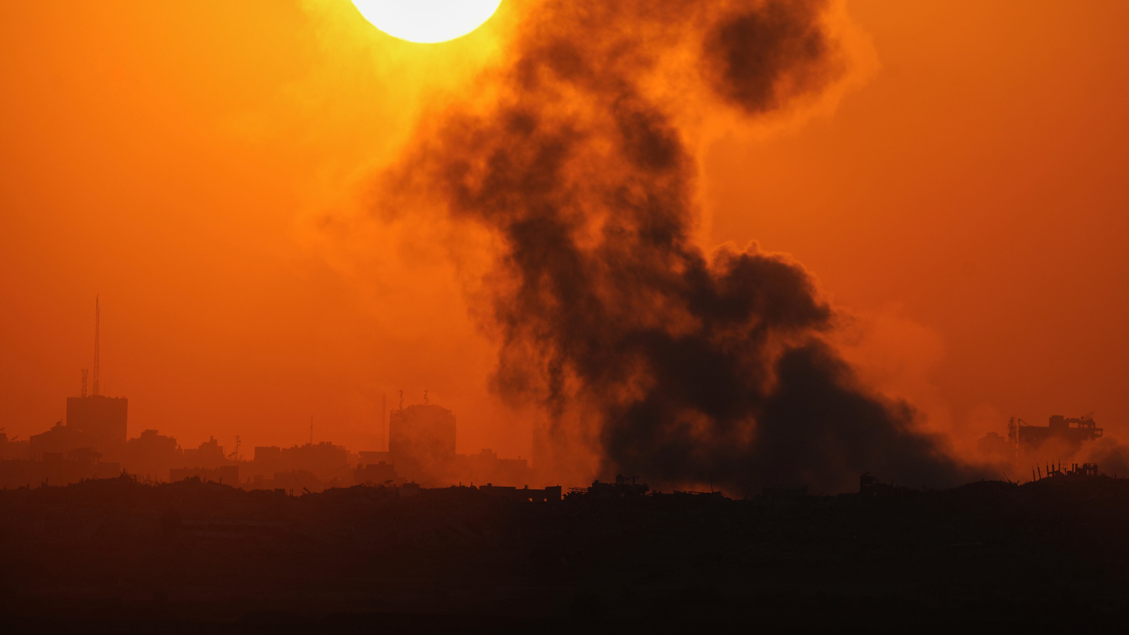 Smoke billows from an explosion in the northern Gaza Strip, as seen from southern Israel Wednesday, July 23, 2025. (AP Photo/Ohad Zwigenberg)